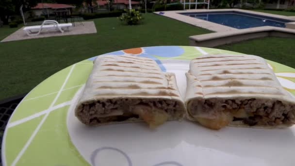 Two Burritos Meat Plate Cut Half Swimming Pool Mexican Cuisine — Stock Video