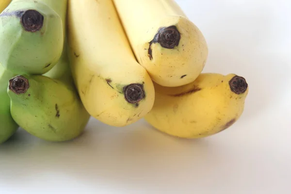 Banana Penteada Sobre Fundo Branco — Fotografia de Stock