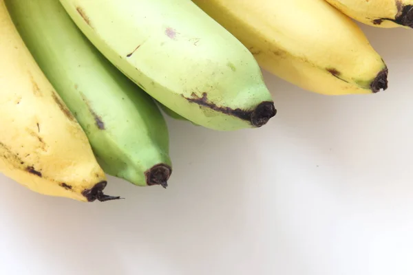 Banana Penteada Sobre Fundo Branco — Fotografia de Stock