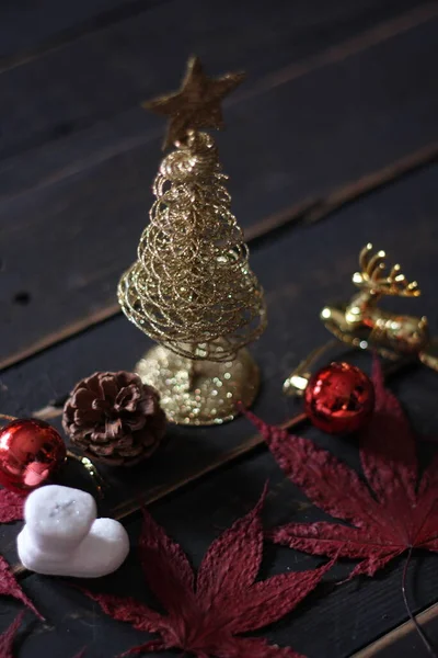 Christmas Decorations Placed Black Wooden Table — Stock Photo, Image