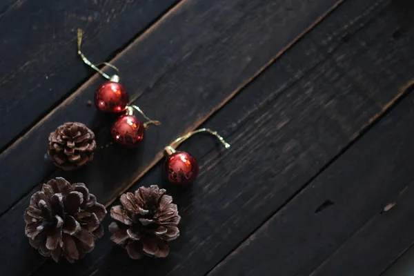 Christmas Decorations Placed Black Wooden Table — Stock Photo, Image