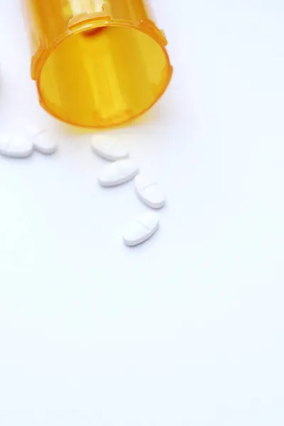 Oval Pills Orange Pill Bottles Were Spread Out White Tabletop — Stock Photo, Image