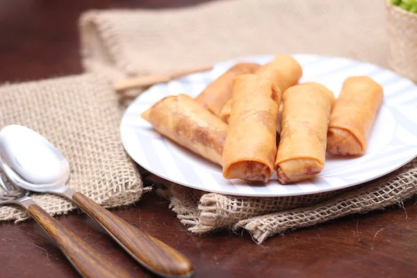 Fried Spring Rolls Vegetables Tomatoes Placed Black Plate White Wooden — Stock Photo, Image