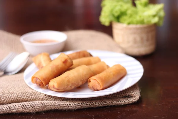 Fried Spring Rolls Vegetables Tomatoes Placed Black Plate White Wooden — Stock Photo, Image