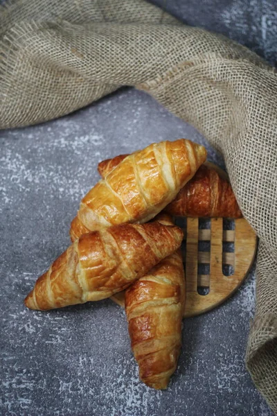 Croissant Bread Stacked Table Wooden Plates Sackcloth — Stock Photo, Image