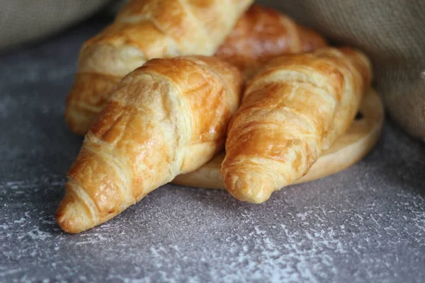 Croissant Bread Stacked Table Wooden Plates Sackcloth — Stock Photo, Image