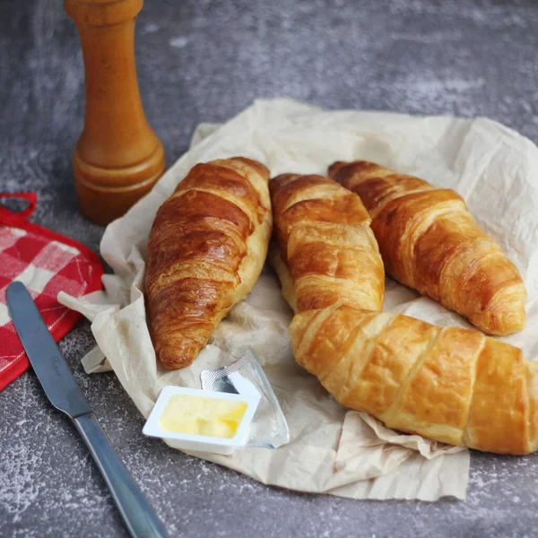 Pile Delicious Fresh Croissants Served Butter Gray Table — Stock Photo, Image