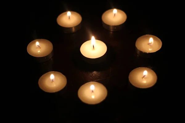 Light Several Candles Wooden Table — Stock Photo, Image