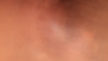 Turuncu, beyaz ve siyah ışıkta soyut görüntü