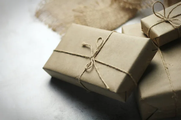 Gift Box Wrapped Brown Recycled Paper Placed White Table — Stok fotoğraf