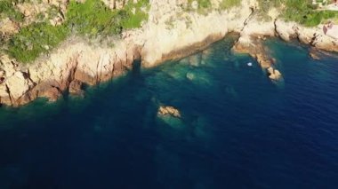 The Calanques de Piana in the middle of the arid countryside, in Europe, in France, in Corsica, towards Ajaccio, by the Mediterranean Sea, in summer, on a sunny day.