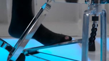 Drummer swings his leg on the hi-hat, 4k 50fps