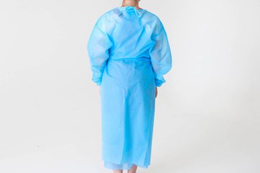 Tek kullanımlık tıp üniforması virüslere ve bakterilere karşı korur.
