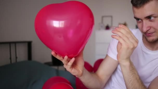 Guy Pops Red Balloon — Stock Video