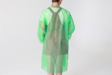 Tek kullanımlık tıp üniforması virüslere ve bakterilere karşı korur.