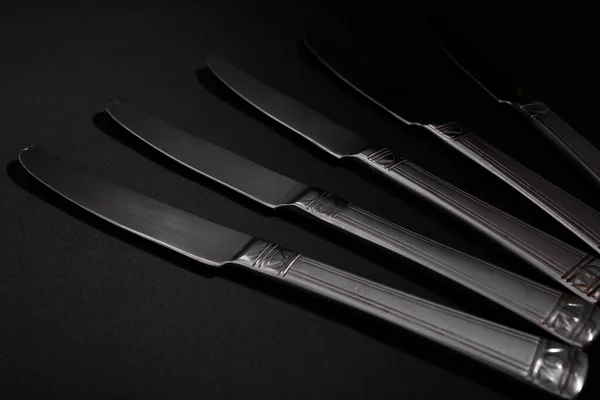 Knives Made Metal Silver Lie Black Background Glare Light — Stock Photo, Image