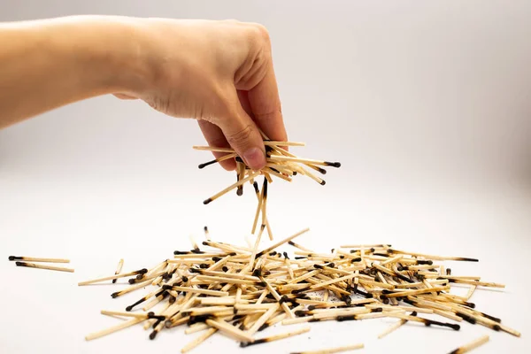 Wooden matches on a white background