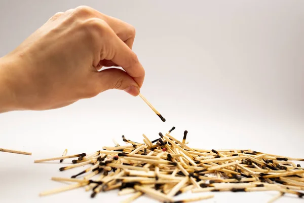 Wooden matches on a white background