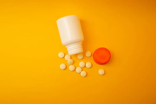 Jar Pills Yellow Background — Photo
