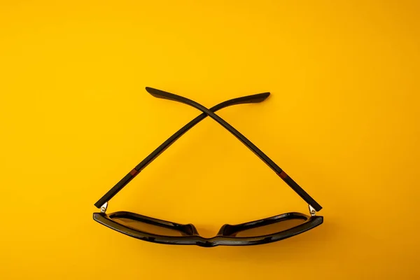 Black Sunglasses Orange Background — Φωτογραφία Αρχείου