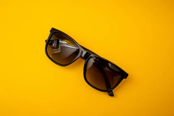 Black Sunglasses Orange Background — Foto Stock