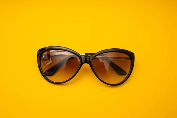 Black Sunglasses Orange Background — Zdjęcie stockowe