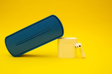 Blue boombox on yellow background, colors of the Ukrainian flag