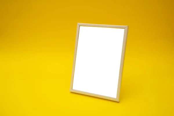 White Photo Frame Yellow Background — Zdjęcie stockowe