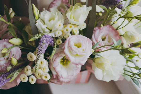 Bouquet of holiday flowers in a box