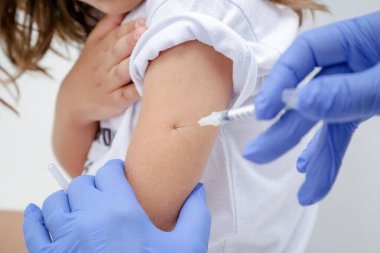 Vaccination of children against covid 19 pandemic striking the world.