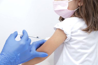Vaccination of children against covid 19 pandemic striking the world.