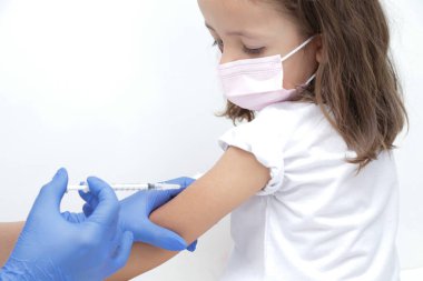 Vaccination of children against covid 19 pandemic striking the world.