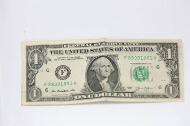 Beyaz arka plan üzerinde izole dolar para .
