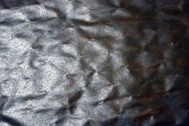 Kahverengi alışılmadık düzensiz arkaplan alışılmadık oyuklar ve dalgalarla.