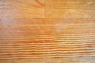 Yellow, light background made of natural wood, opened with building varnish. Unimaginable wooden boards with their structure, texture and pattern. It looks very stylish.