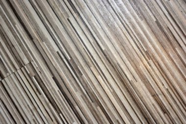 An interesting wooden textured background consists of white, black, gray, beige stripes, emitting a tree, a building textured coating.