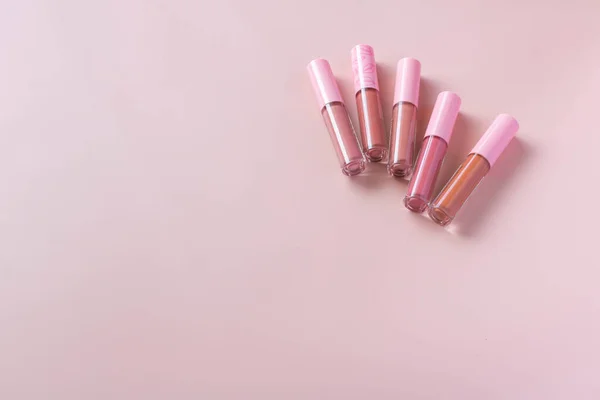 Group Different Shades Liquid Lipsticks Pink Background — Stok fotoğraf