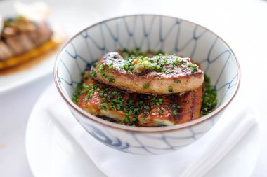 Grilled eel rice bowl with foie gras on top, unadon.