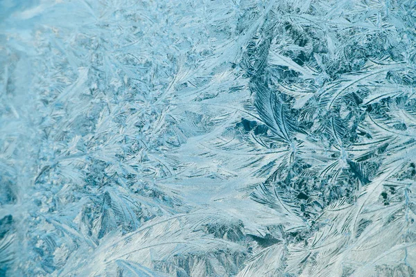 Ijzige Patronen Glas Kerst Achtergrond Blauw Ijs Het Winterraam Abstracte — Stockfoto