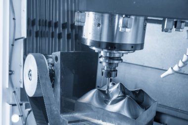 Abstract scene of hi-precision CNC milling machine cutting the mold parts. The mold parts cutting process by machining center with solid ball end mill.