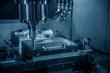 CNC değirmen makinesi, enjeksiyon küf parçalarını indekslenebilir araçlarla kesiyor. Kalıplar ve ölüm üretim süreci, son değirmen araçları ile makine merkezi tarafından.