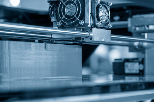 The additive manufacturing by  3D printer machine. The high technology manufacturing process by rapid prototype method. 