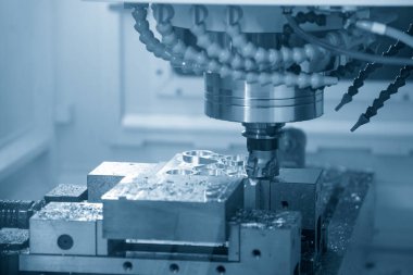 The CNC milling machine rough cutting the injection mold parts by  indexable mill tool. The mold and die manufacturing process by machining center with the solid endmill tools.