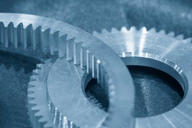 Close-up scene of the automatic transmission gear part. The abstract scene of gear part in the mechanical parts manufacturing system.