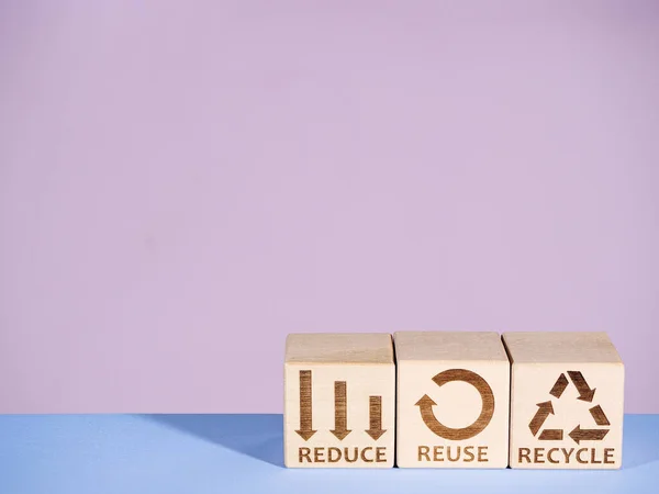 REDUCE, REUSE and RECYCLE symbols as a resource conservation concept