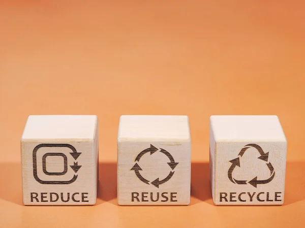 REDUCE, REUSE and RECYCLE symbols as a resource consumption management concept