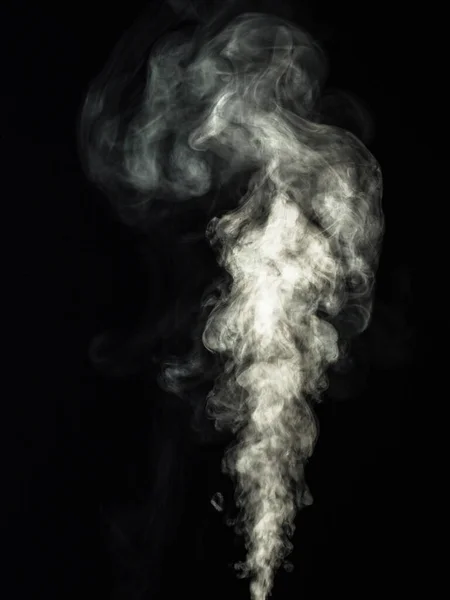 抽象的な効果としてカールで発生した黒の背景に白い煙 — ストック写真
