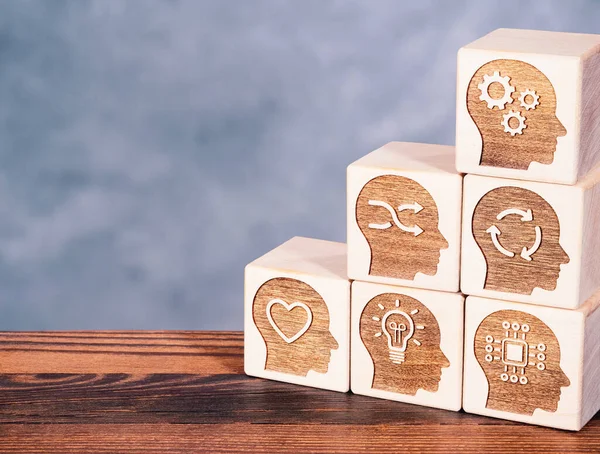 Soft power skills symbols on wooden cubes as concept of enhanced management capability