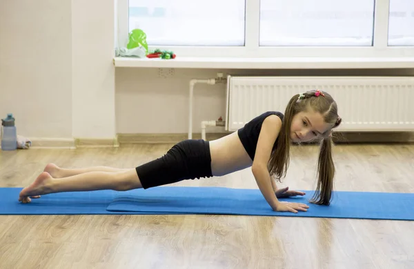 Children Fitness Asana Plank Exercise — стоковое фото