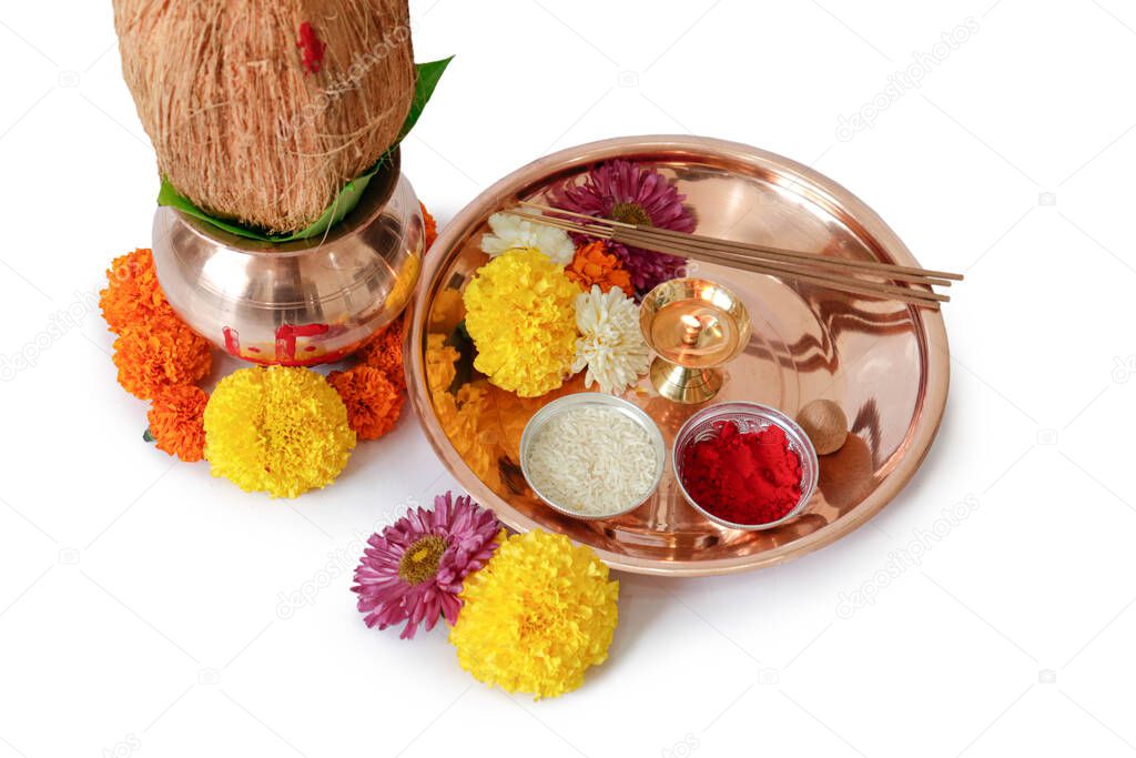 kalash pujan ganesha pujan Indian festival akshaya tritiya Decorative kalash with coconut and leaf with floral decoration